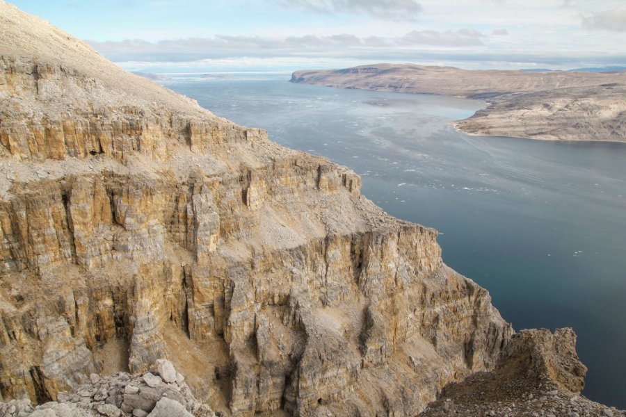 The Angmaat Formation above Tremblay Sound on the Baffin Island coast. Bangiomorpha pubescens fossils occur in this roughly 500-meter thick rock formation. Credit: Timothy Gibson